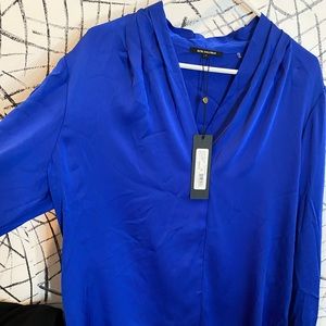 Kobi Halperin's silk Nellie pullover blouse offers a shawl collar